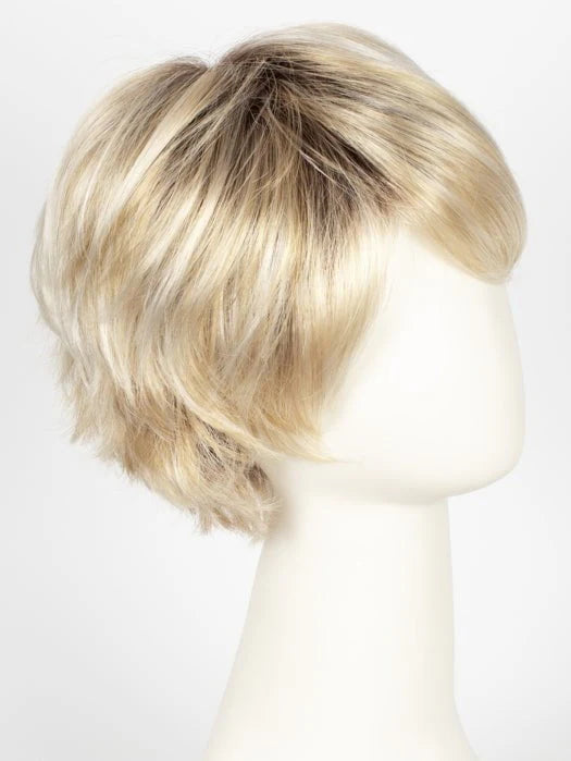 Layered pixie style short silver wig for women with natural roots and side swept bangs on mannequin head