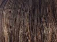 Close up of Wigalert short layered synthetic wig in brown with honey highlights showing textured layered fibers