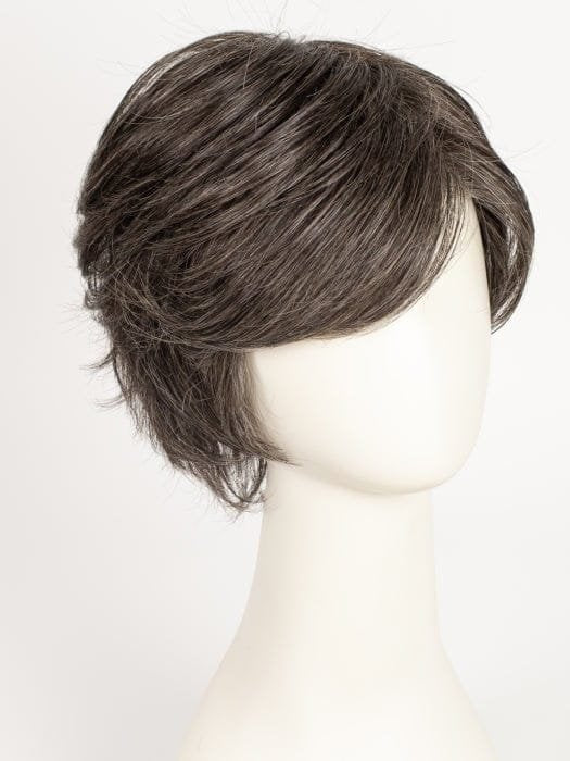 short layered synthetic wig in natural brown with subtle highlights on a mannequin for everyday styling