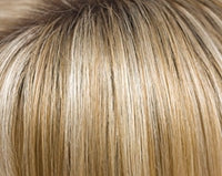 Close up of blonde highlighted top showing natural scalp part and silky texture of short layered synthetic wig