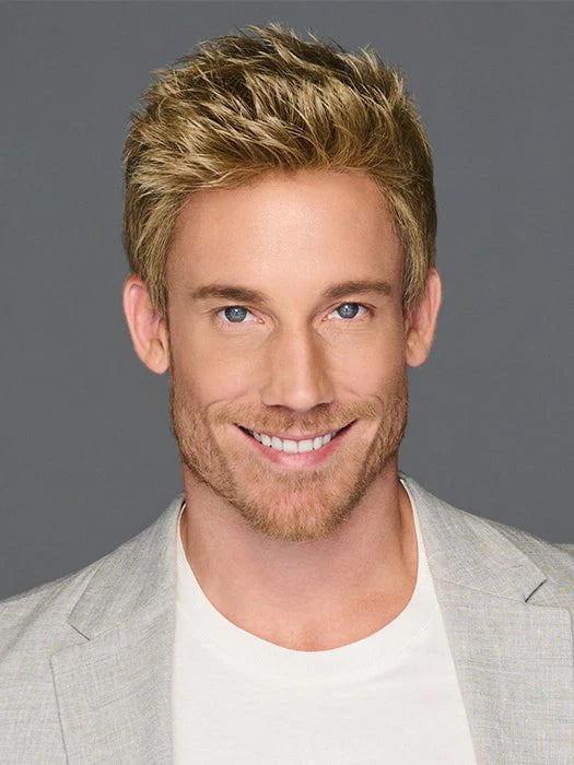 Male model wearing HairUWear Dapper HIM wig for men short textured blonde style with light beard and gray blazer
