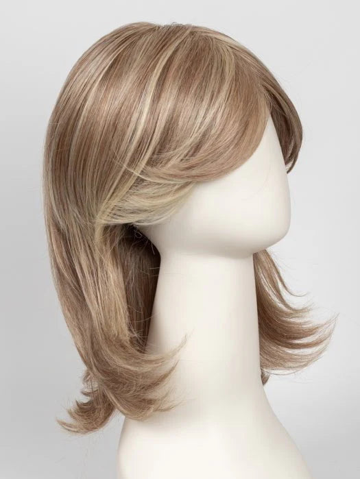 Raquel Welch Goddess wig mid length layered blonde with side swept bangs and flipped ends on mannequin