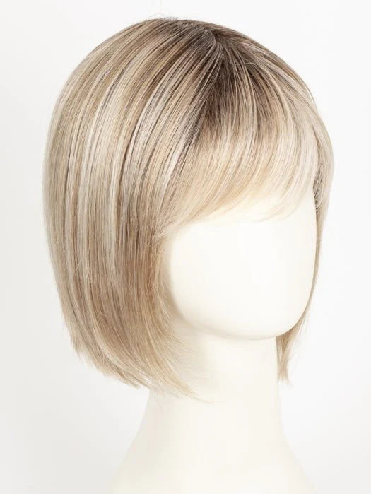 Mannequin wearing a short sleek bob with soft bangs and natural roots blonde synthetic wig Ellen Wille ideal for everyday wear