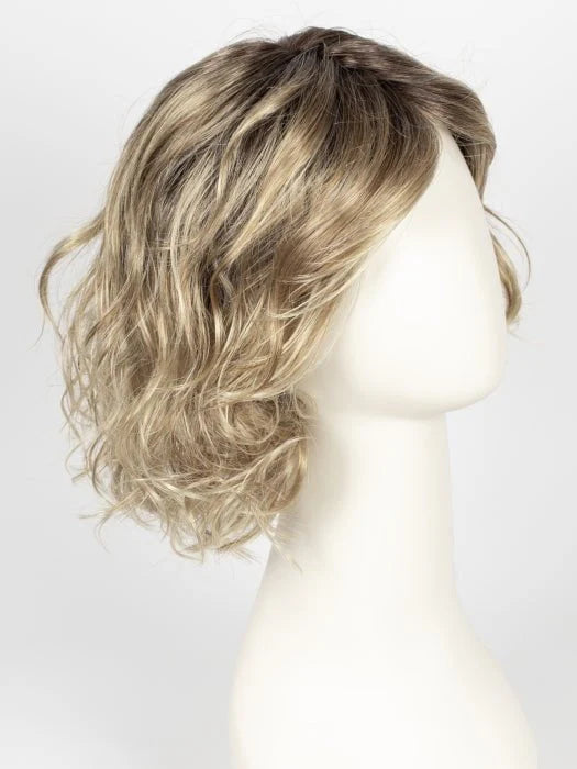 Ellen Wille Girl Mono wig in wavy blonde style displayed on a mannequin for a natural look.