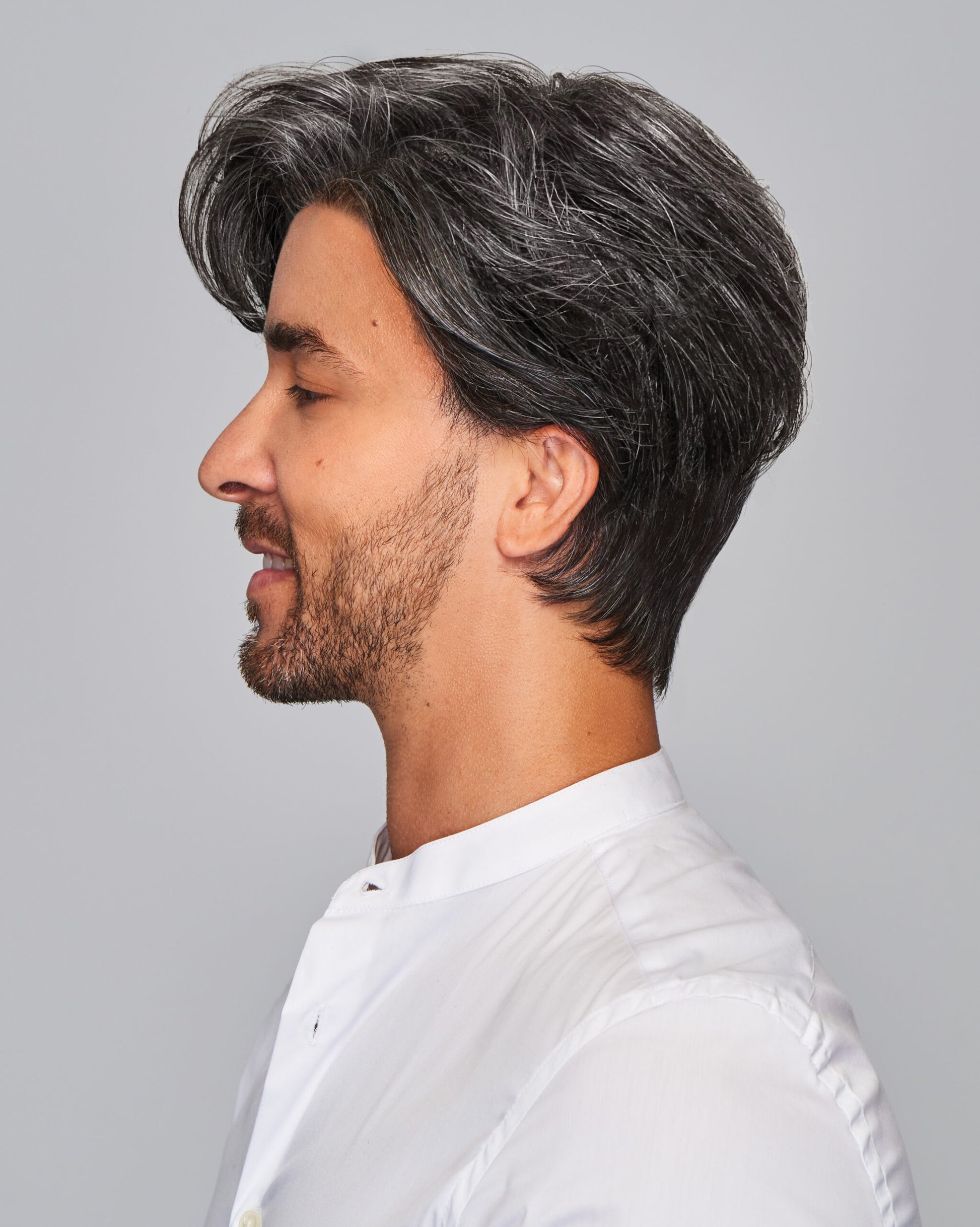 Gallant HIM wig for men. Side profile of HairUWear salt and pepper medium layered wig with natural texture