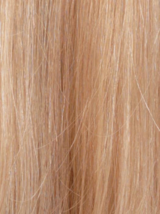 Close-up of soft blonde strands showcasing a human hair wiglet for thinning hair