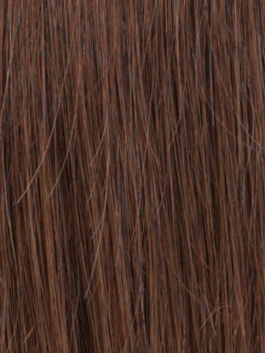 Close-up of a human hair wiglet for thinning hair in rich brown color with natural texture