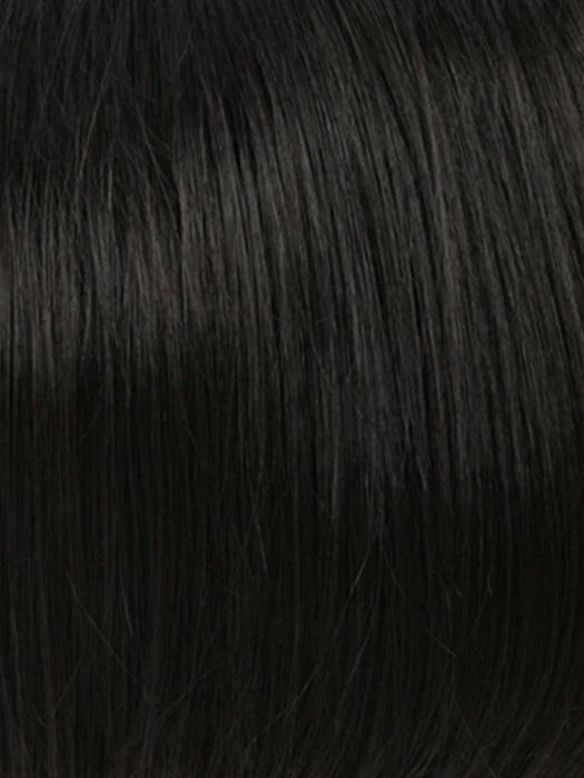 Close-up of a sleek black human hair wiglet for thinning hair with a natural look and smooth texture