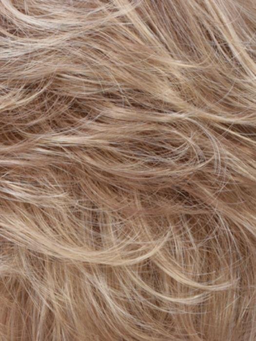 Close-up of soft blonde strands of a human hair wiglet for thinning hair