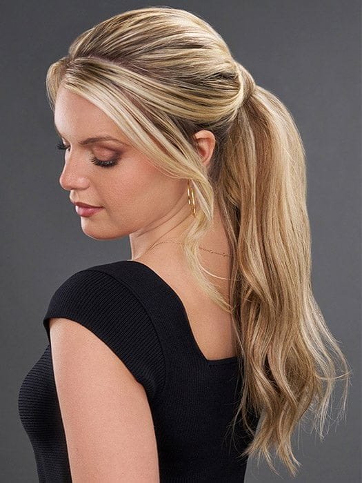 Wigalert blonde synthetic ponytail clip long wavy high pony on model with natural highlights and face framing strands