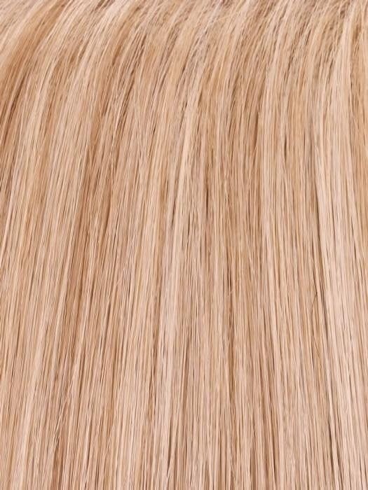 Wigalert blonde synthetic ponytail clip close up showing smooth natural looking strands and soft shine