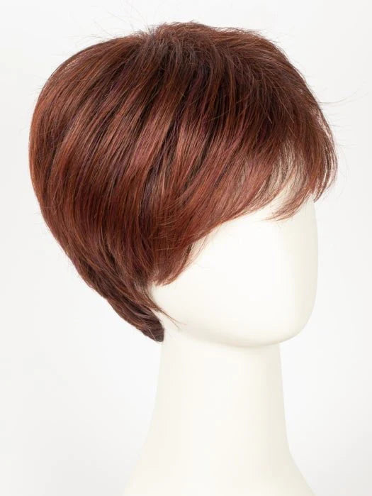 Short blonde synthetic wig displayed in auburn brown shade on mannequin with side swept bangs