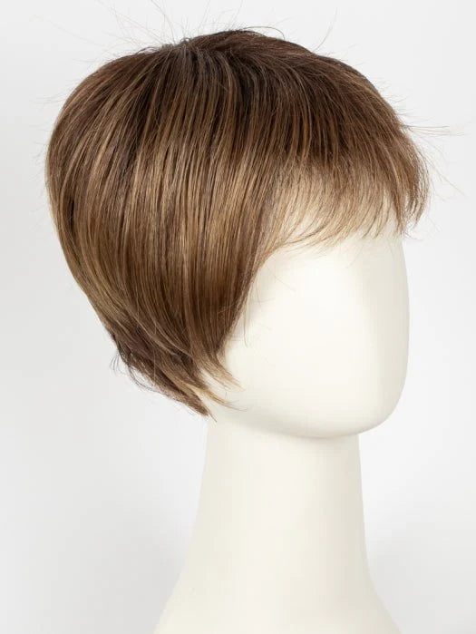 short blonde synthetic wig on white mannequin head layered pixie cut with textured side bangs