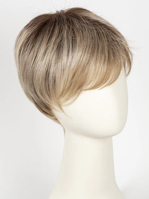 Mannequin wearing short blonde synthetic wig styled in layered pixie cut with side swept bangs and natural roots