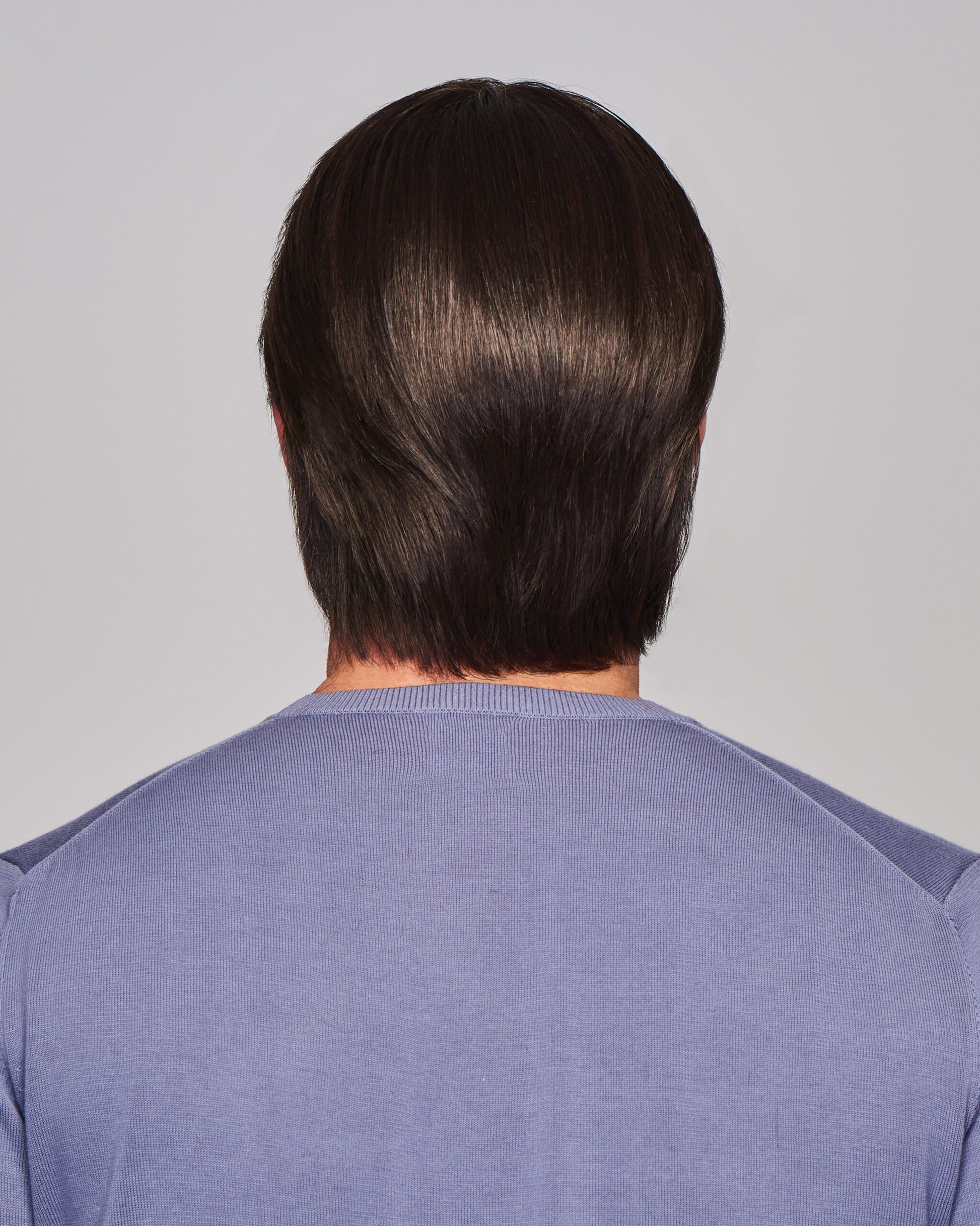 Sharp HIM wig for men by HairUWear back view showing dark brown layered medium length natural shine hairpiece