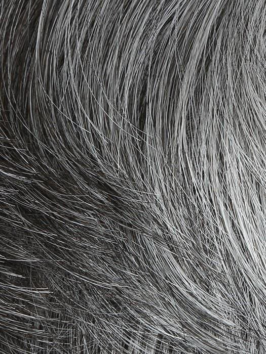 Close-up gray hair texture of HairUWear men's chiseled wig showing natural wave and fine fiber detail