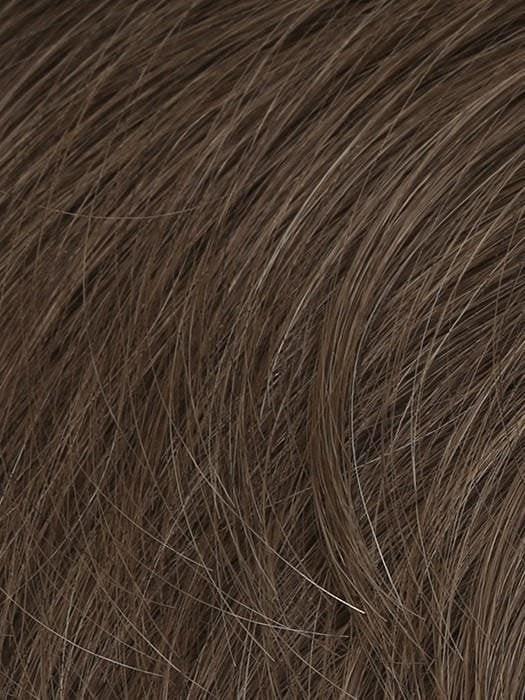 HairUWear men's chiseled wig close up showing medium brown textured hair fibers with subtle gray highlights
