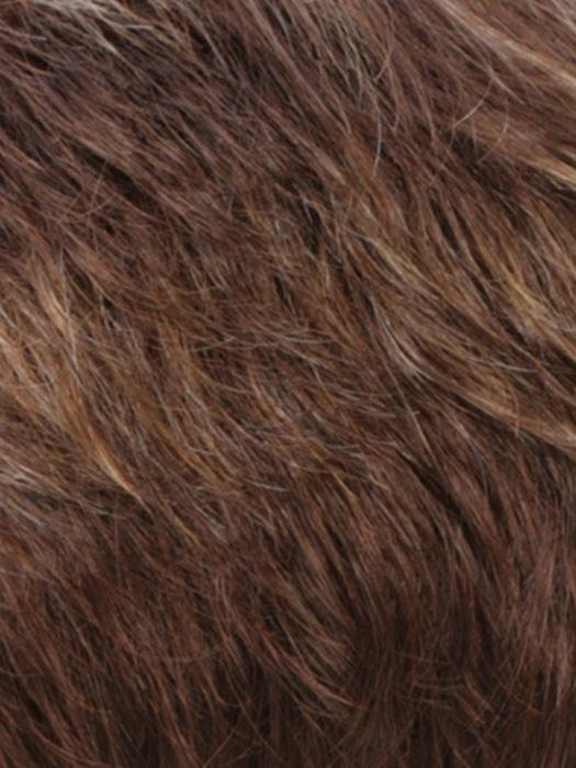 Close-up of a monofilament hair topper for thinning hair with soft waves and natural color blend