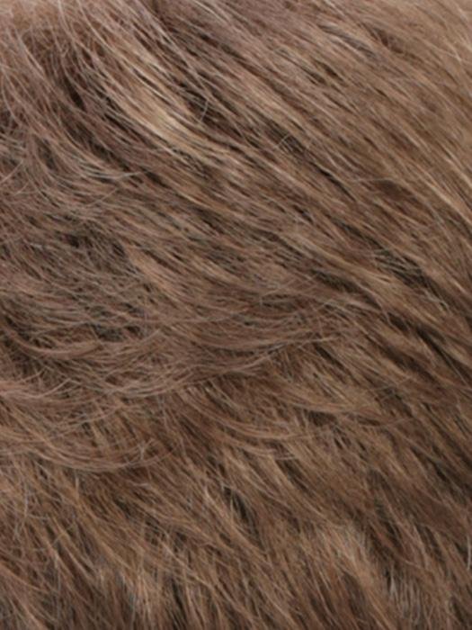Close-up of a monofilament hair topper for thinning hair in natural brown color