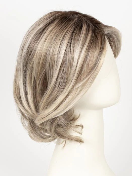 Raquel Welch Crowd Pleaser wig on mannequin layered ash blonde bob with side part and soft waves