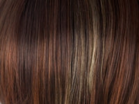 Straight brunette strands with caramel and ash blonde highlights on Zara wig by Rene of Paris