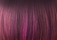Close up of burgundy and magenta straight hair fibers on Zara wig by Rene of Paris showing smooth texture