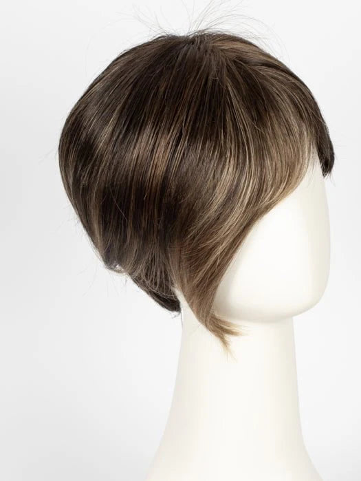 Stylish short synthetic wig for women in a tousled bob hairstyle with subtle highlights
