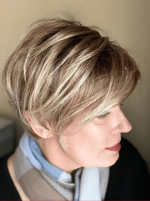 Stylish short synthetic wigs for women in layered blonde with subtle highlights for a natural look